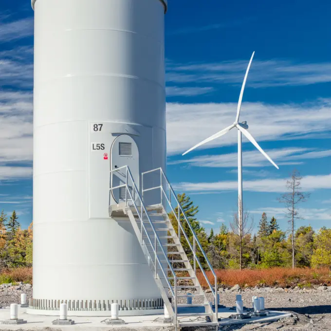 Henvey Inlet wind turbine base - Blue sky and forest background