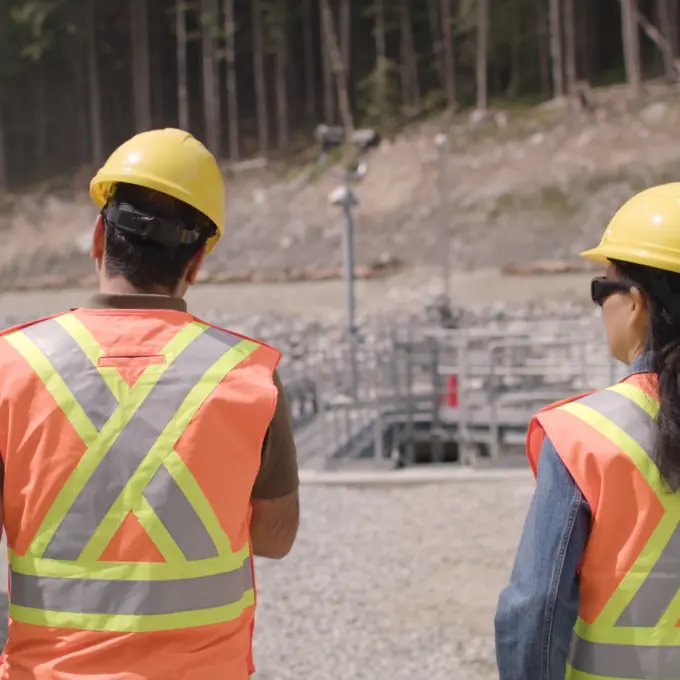 Hydropower plant - Two employees walking
